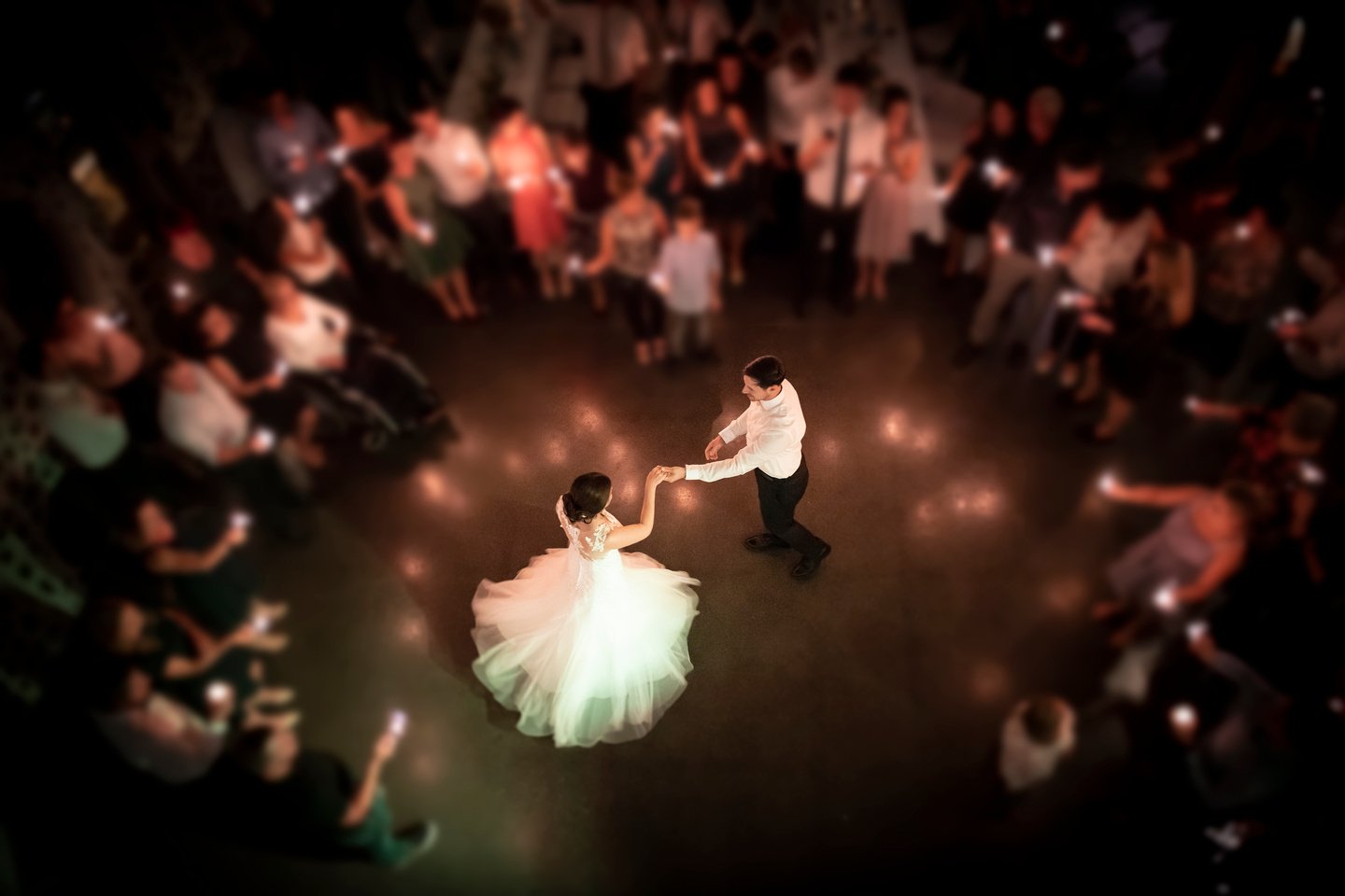 wedding couple dancing at their party