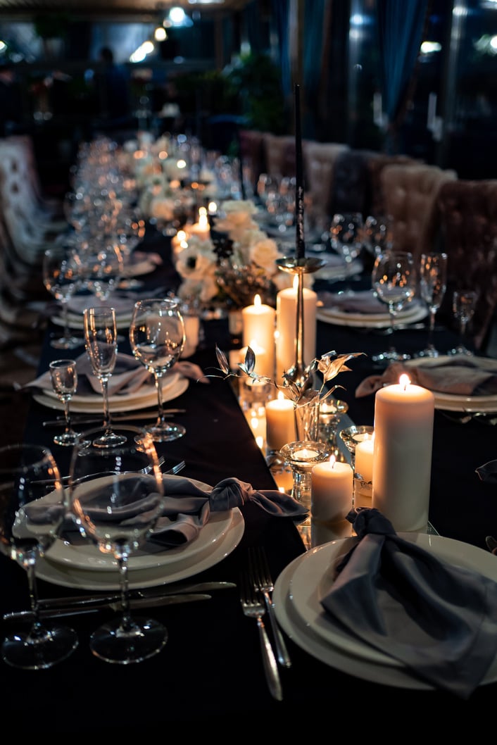 festive table setting candles for wedding party